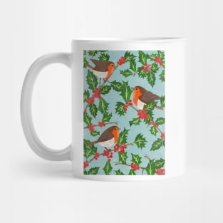 Three little paper cut robins on a holly bush Mug